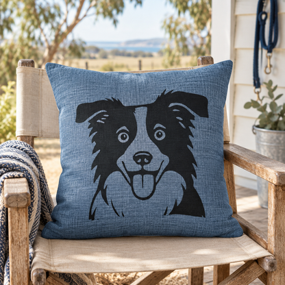 Blue Border Collie cushion cover on a timber chair overlooking a rural coastal landscape