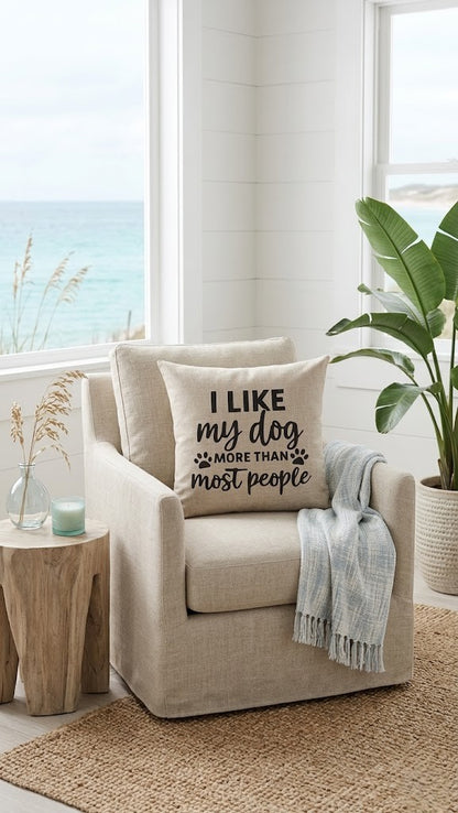 I Like My Dog More Than Most People natural dog mum cushion on beige armchair in coastal beach house — dog quote cushion by Rieko's World Australia