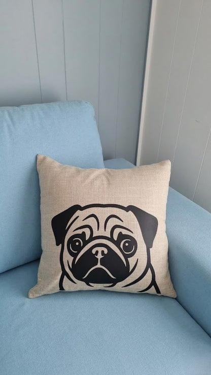 Beige pillow with a black pug design on a light blue couch - pug mum gift Australia by Rieko's World