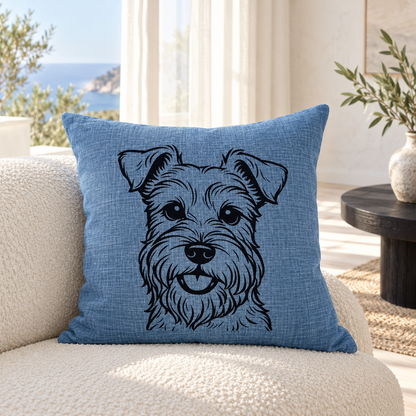 Schnauzer dog cushion in blue linen look colour styled on a sofa in a bright living room.