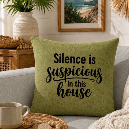 Silence is Suspicious in This House olive green dog mum cushion styled on grey couch with coastal decor — Rieko's World Australia