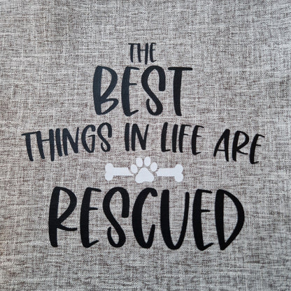 A light grey cushion cover with the text 'THE BEST THINGS IN LIFE ARE RESCUED' printed on it, - dog gift, Australia by Rieko's World.